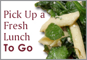 Graphic with salad and text reading Pick up a fresh lunch to go