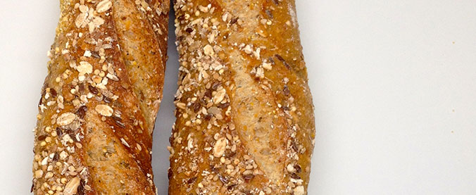 Detail photo of two whole wheat baguettes