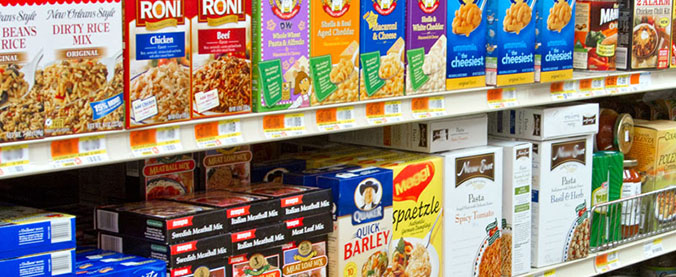 Image of grocery aisle with rice, pasta, and grains boxes