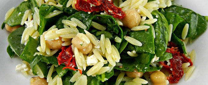 Image of orzo, spinach, chickpea, sundried tomato, and feta salad